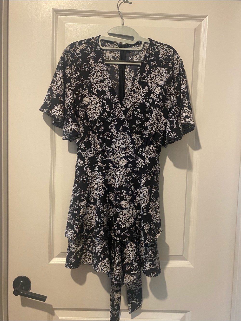 Black Floral Romper with Ruffle Hem